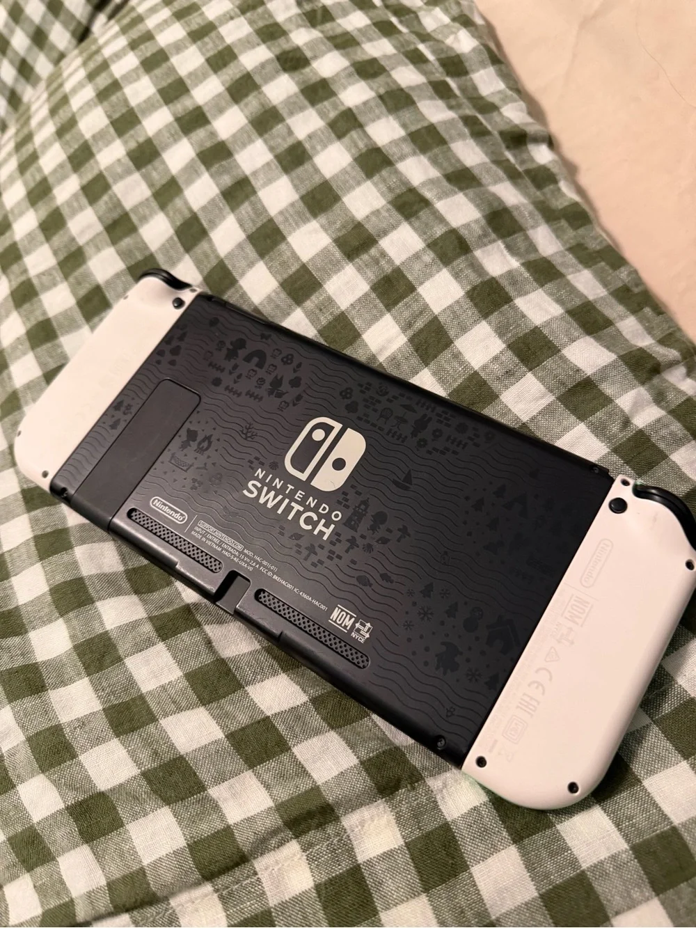 Nintendo Console with Mint & Teal Joy-Con Controllers